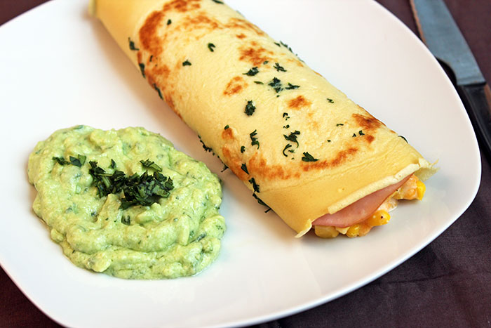 Pancake-with-jam,-corn-and-avocado